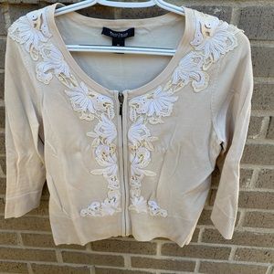 Tan sweater with appliqués size medium